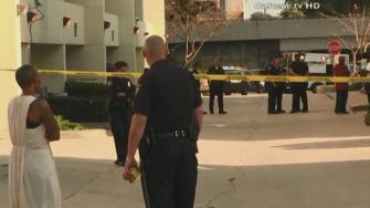 A man allegedly armed with a machete-like blade was shot and killed by Inglewood police Saturday, May 18, 2013, after smashing the windows of eight squad cars parked on the grounds of their police station.