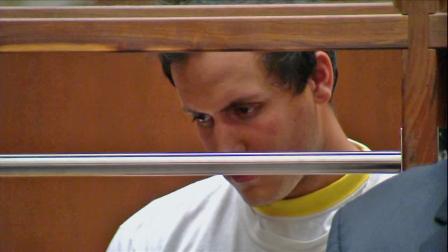 Miguel Schiappapietra is seen in court Tuesday, May 21, 2013. Schiappapietra is a Los Angeles police officer accused of assaulting two young girls in Castaic.