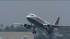 An America West airplane departs on Wednesday, May 22, 2013.