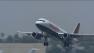 An America West airplane departs on Wednesday, May 22, 2013.