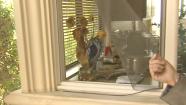A damaged window is shown in a Duarte home, the scene of a bear break-in on Wednesday, May 22, 2013.