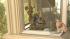 A damaged window is shown in a Duarte home, the scene of a bear break-in on Wednesday, May 22, 2013.