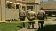 Deputies investigate on Thursday, May 23, 2013, at the Palmdale apartment where an 8-year-old boy was found unconscious.