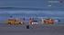A small boat containing nearly a ton of drugs washed ashore in Manhattan Beach on Saturday, May 25, 2013.