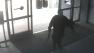 A surveillance photo shows the suspected gunman entering the Santa Monica College library on Friday, June 7, 2013.