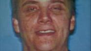 Michael Rodney Kane, 46, is seen in this photo provided by the Department of Motor Vehicles.