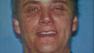 Michael Rodney Kane, 46, is seen in this photo provided by the Department of Motor Vehicles.