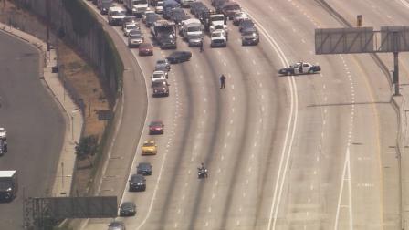 Northbound lanes of the 110 Freeway were shut down between the 105 Freeway and Florence Avenue due to a car-to-car shooting Tuesday afternoon, July 2, 2013.