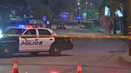 An El Monte Police Department vehicle is parked behind crime tape near the scene of a fatal car crash in El Monte on Monday, July 29, 2013.