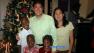 Matthew and Grace Huang are seen with their three adopted children in this undated photo.