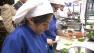 Los Angeles Unified School District cooks prepare food for student lunches.