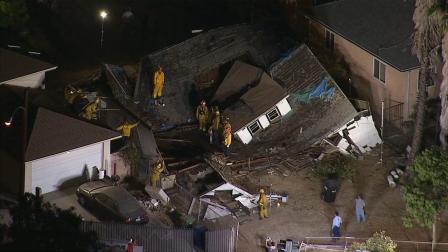 A house on the 500 block of South Humphreys Avenue in East Los Angeles collapsed on Friday, Aug. 30, 2013.