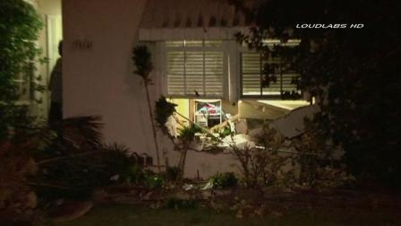 Authorities respond to the scene of a single-vehicle crash that sent a truck into a home in the 7500 block of Vicki Drive in Whittier on Sunday, Sept. 1, 2013.