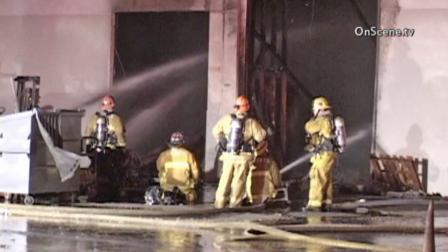Firefighters knock down a fire at a mechanic shop on the 2600 block of Pacific Drive in unincorporated Whittier on Monday, Sept. 2, 2013.