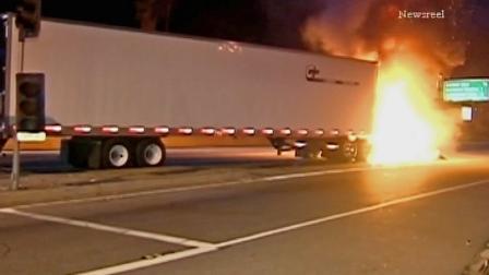 A big rig trucks cab caught fire on the northbound 101 Freeway in the Cahuenga Pass on Wednesday, Sept. 4, 2013.