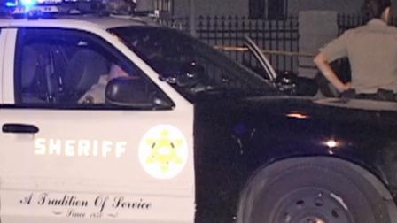 A sheriffs department patrol vehicle is shown at the scene of a shooting in Willowbrook on Wednesday, Sept. 4, 2013.