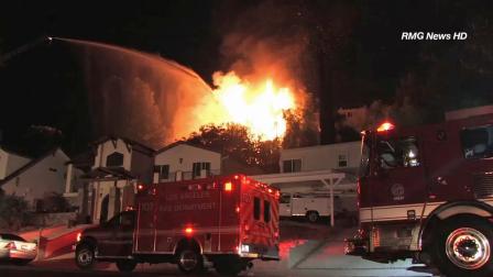 A fire ripped through a home on the 5200 block of Calatrana Drive in Woodland Hills on Saturday, Sept. 7, 2013.
