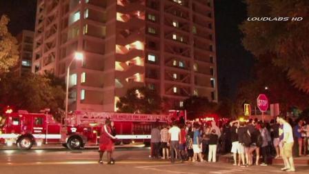 A trash bin fire at Webb Hall, a 15-story USC dormitory, sent hundreds of students into the streets Friday, Sept. 13, 2013.