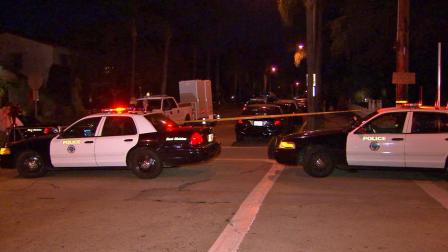 Authorities respond to 2nd Street and Park Avenue in Long Beach following an officer-involved shooting on Saturday, Sept. 21, 2013.