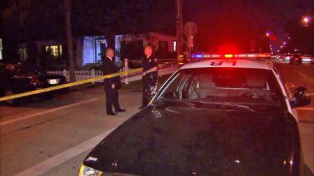 Authorities respond to 2nd Street and Park Avenue in Long Beach following an officer-involved shooting on Saturday, Sept. 21, 2013.