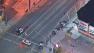 Los Angeles police vehicles are shown at the scene of a fatal hit-and-run crash in the 6700 block of Santa Monica Boulevard in Hollywood on Friday, Sept. 27, 2013.