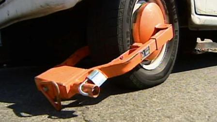 An impounded vehicle with a boot is seen in this undated file photo.