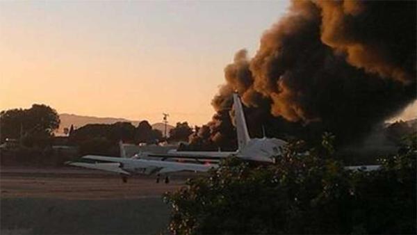 Smoke is seen following a small plane crash at Santa Monica Airport in the 3000 block of Donald Douglas Loop Sunday, Sept. 29, 2013.