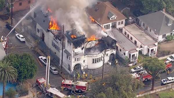 A fire burns at a church in Los Angeles on Tuesday, Oct. 8, 2013.