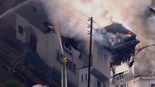 Firefighters battle a fire at a historic church in Los Angeles on Tuesday, Oct. 8, 2013.