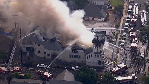 3 injured battling fire at historic LA church