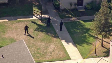 Police investigate an officer-involved shooting in Pasadena on Friday, Oct. 11, 2013.