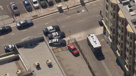 Police officers shot a woman who was armed with a knife in downtown Los Angeles on Friday, Oct. 11, 2013.