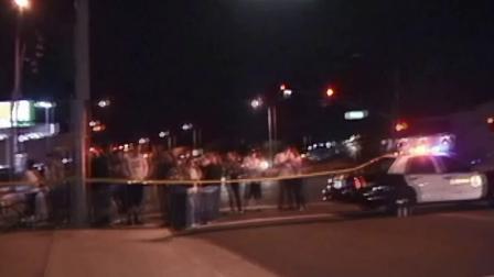 Police and others gather near the site where a man was hit and killed by a train in Palmdale on Saturday, Oct. 19, 2013.