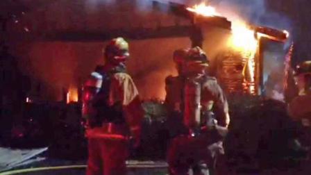 Flames rip through a home in the 900 block of North Evergreen Street in Burbank on Saturday, Oct. 19, 2013.