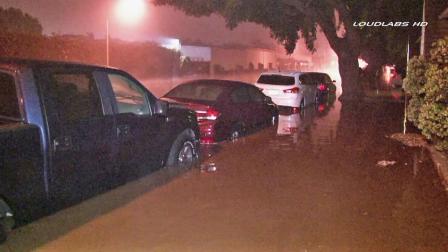 Streets flooded in Long Beach following a water main break on Saturday, Oct. 26, 2013.