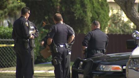 Police respond to a call of a shooting at a home on the 8500 block of Fontana Street in Downey on Friday, Oct. 25, 2013.