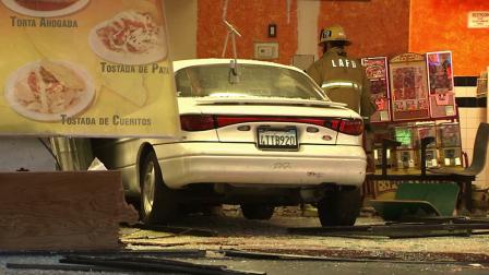 An elderly man crashed his car into the El Taco Llama restaurant at Topanga Canyon Boulevard and Saticoy Street in Canoga Park on Saturday, Nov. 2, 2013.