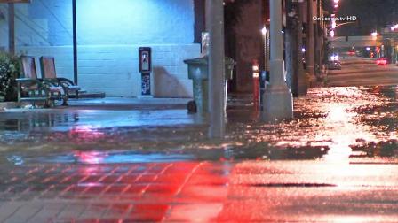 Water collects on the roads after a water main broke in Koreatown in Los Angeles on Saturday, Nov. 23, 2013.