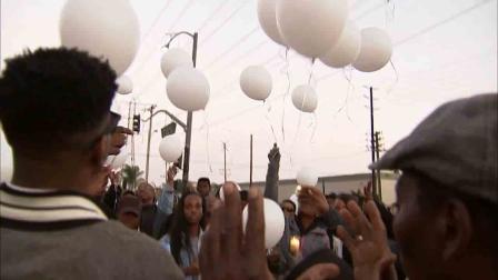 Friends and family gathered at the corner of Greenleaf Boulevard and Wilmington Avenue in Compton Saturday, Dec. 21, 2013 to celebrate the life and birthday of Stacey Garcia Gray, who was killed following a high-speed chase on Saturday, Dec. 14, 2013.