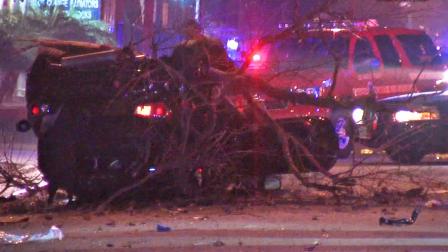 A car is shown flipped upside down following a violent car accident in Bellflower on Saturday, Jan. 4, 2014.