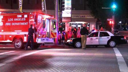 Authorities respond to the intersection of Olympic Boulevard and Alvarado Street in the Westlake area of Los Angeles following a hit-and-run Sunday, Jan. 5, 2013.