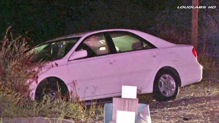 A carjacking suspect crashed the stolen vehicle on the northbound 2 Freeway near Foothill Boulevard in Glendale on Tuesday, Jan. 7, 2014.