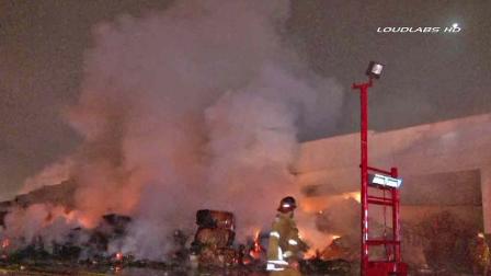 A paper recycling plant on the 2800 block of Vail Avenue in Commerce erupted in flames Sunday, Jan. 12, 2013.