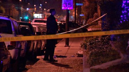 Authorities investigate the scene where a man was found beaten in Burbank on Saturday, Jan. 25, 2014.