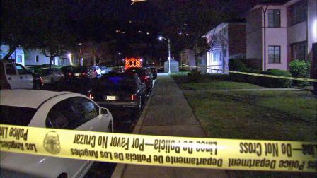 Police respond to the area near Santa Tomas Drive and Abourne Road in Baldwin Hills after a man was found dead Monday, Feb. 3, 2014.