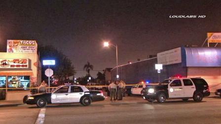 Authorities respond to the scene of a fatal shooting on the 900 block of Fraser Avenue in East Los Angeles Friday, Feb. 21, 2014.
