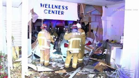 Authorities respond to the scene of a crash at Phoenix Pharmacy on the 2500 block of Washington Boulevard in Pasadena Monday, Feb. 24, 2014.