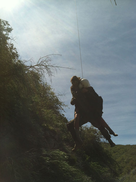 Rescuers are seen loading up missing hiker Kyndall Jack on Thursday, April 4, 2013.