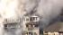 A four-alarm fire damaged three beachfront homes...