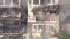 A four-alarm fire damaged three beachfront homes...